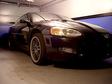 2002 Stratus, it is a sleeper. Will blow you away with 15psi of boost putting down over 400hp