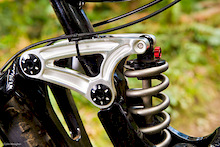 Suspension in the back is maintained by a Rockshox Kage shock with a 450lb ti spring. The upper rockers ride on 16mm pivot pins to increase frame stiffness.